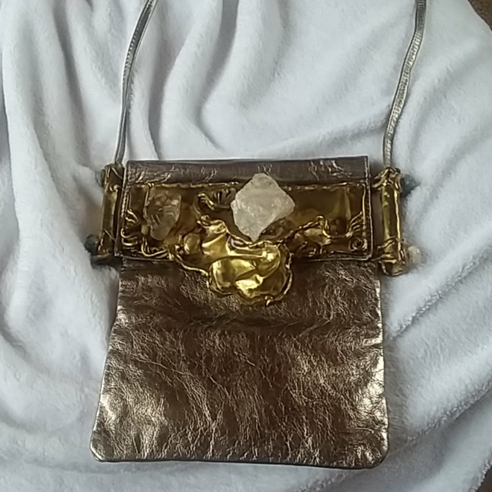 One of a kind pewter leather with brass
